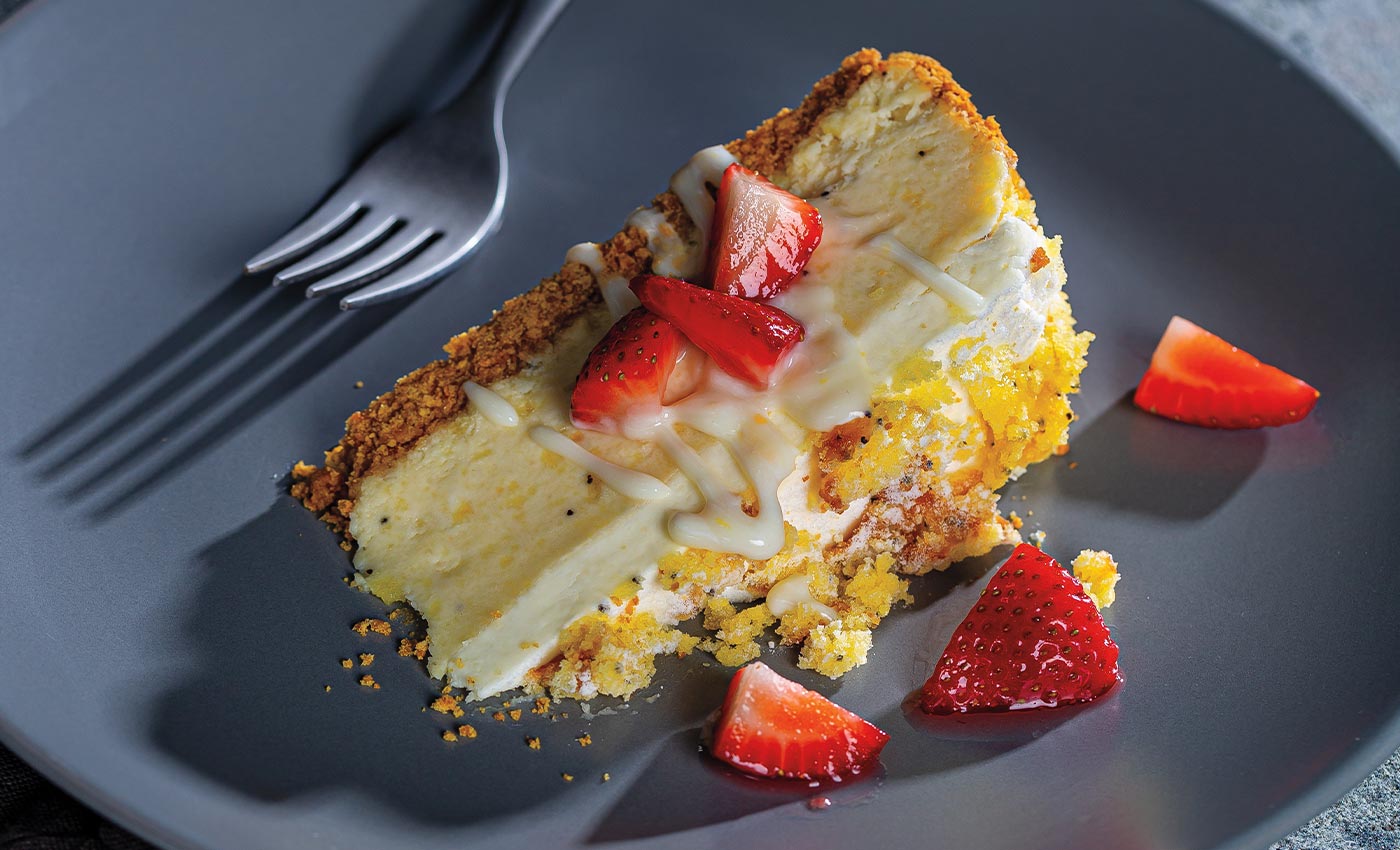 Lemon Poppy Seed Bread Cheesecake With Macerated Strawberries and Yogurt