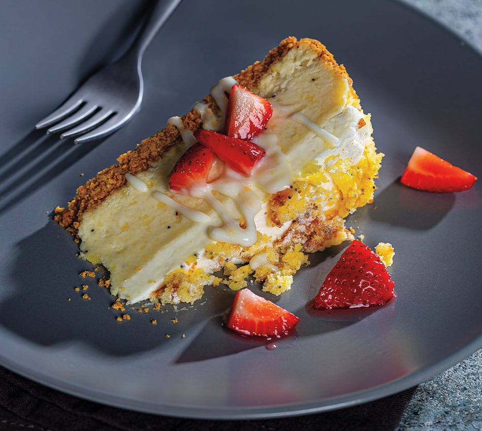 Lemon Poppy Seed Bread Cheesecake With Macerated Strawberries and Yogurt