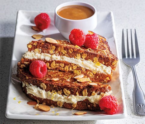 lemon ricotta stuffed french toast with oat, and raspberries