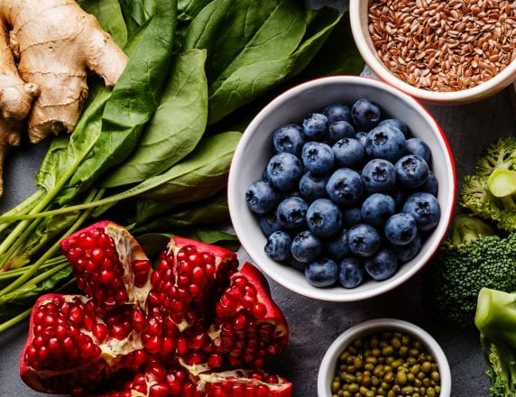 food ingredients including ginger, spinach, pomegranate, blueberries, broccoli, and grains - Sysco Simply