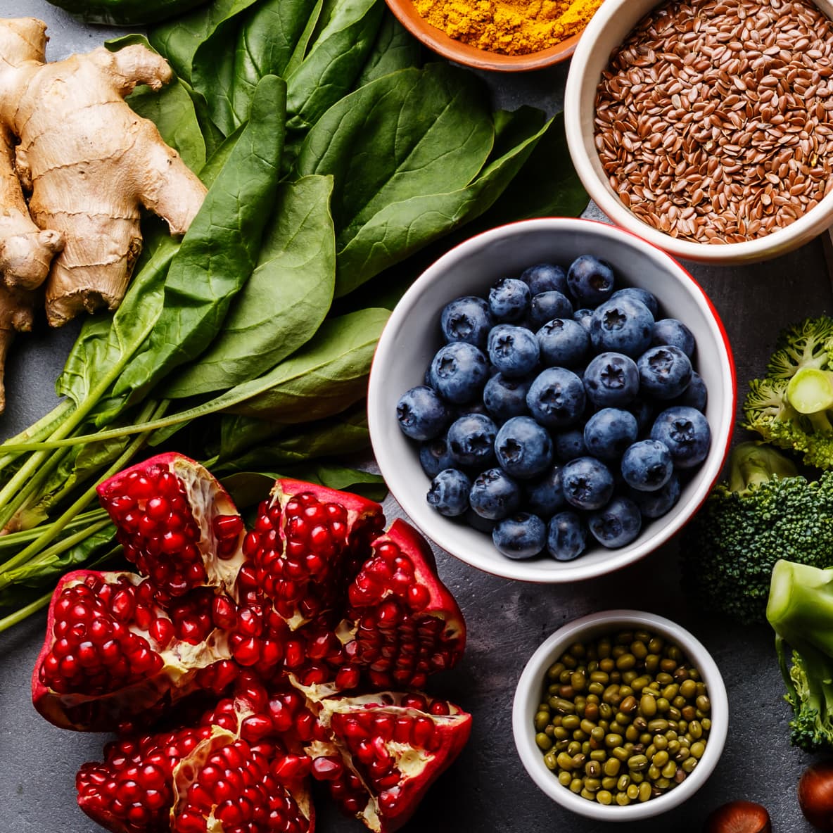 food ingredients including ginger, spinach, pomegranate, blueberries, broccoli, and grains - Sysco Simply