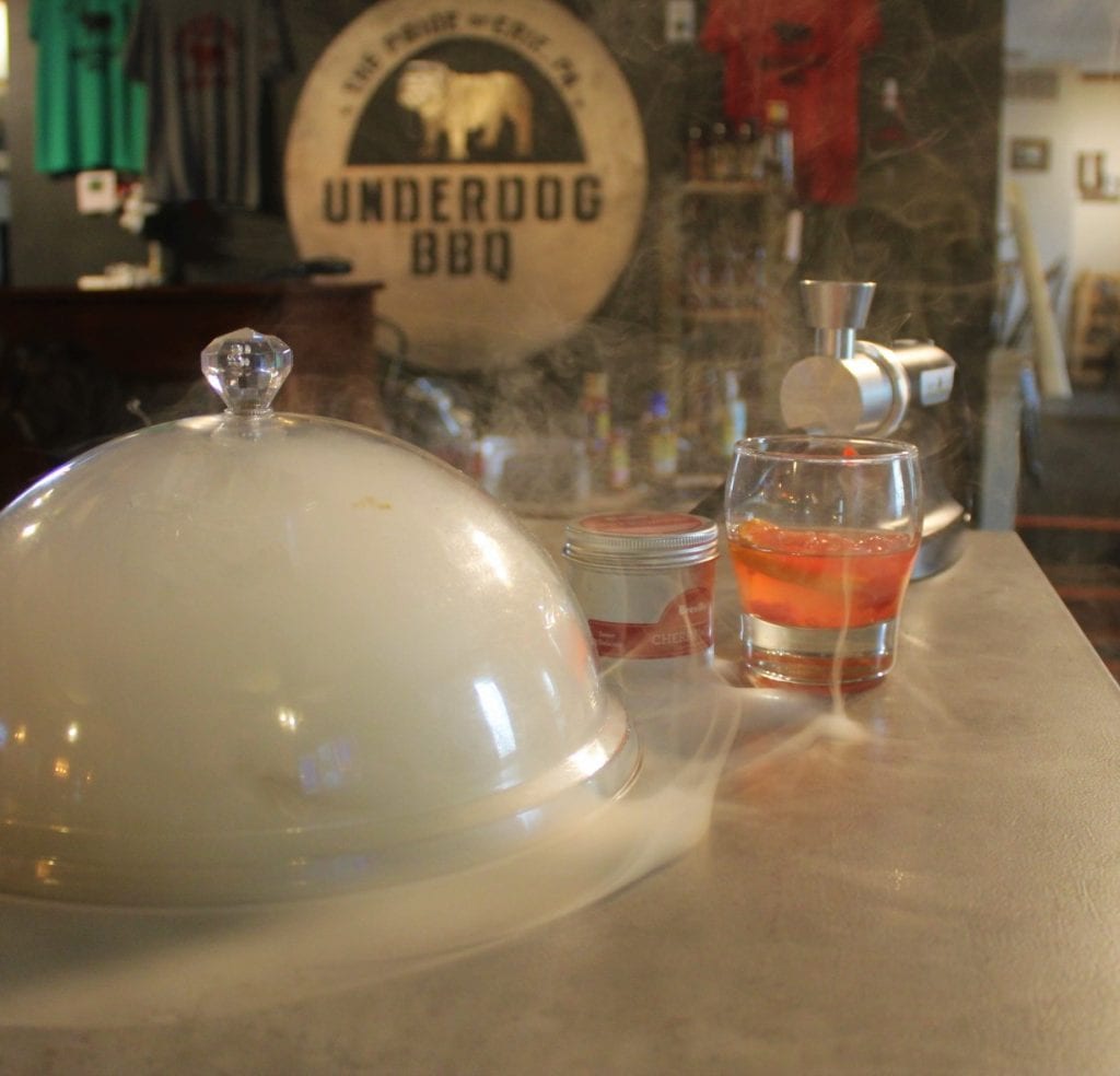 Cowboy smoke in a cloche at Underdog BBQ