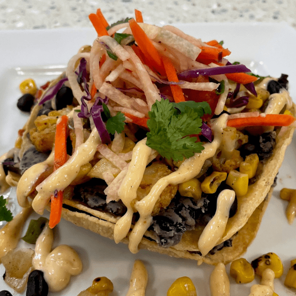 Spicy Cauliflower Tostada With Black Bean Corn Salsa And Jicama Slaw Sysco Foodie