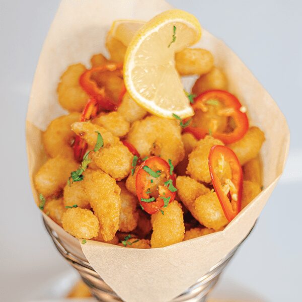 popcorn shrimp in a basket